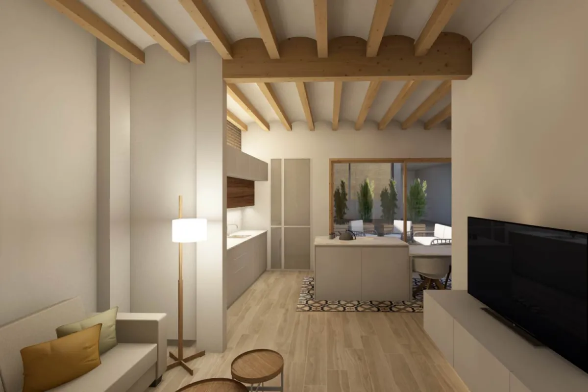 Salón y cocina casa de pueblo de La Silla Salón y cocína diáfanos con suelo laminado y vigas de madera en el techo